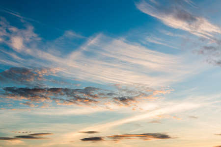 colorful dramatic sky with cloud at sunset.の写真素材