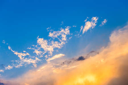 colorful dramatic sky with cloud at sunset.の写真素材