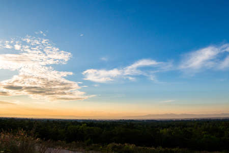 colorful dramatic sky with cloud at sunset.の写真素材