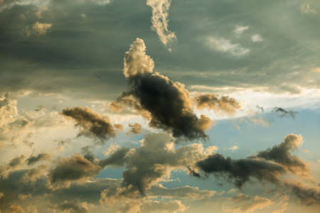colorful dramatic sky with cloud at sunset.