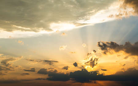 colorful dramatic sky with cloud at sunset.