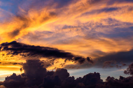 colorful dramatic sky with cloud at sunset.