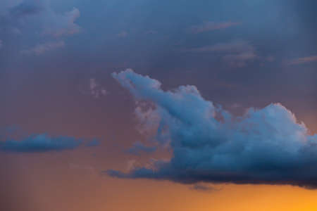 colorful dramatic sky with cloud at sunset.
