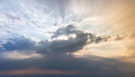colorful dramatic sky with cloud at sunset.
