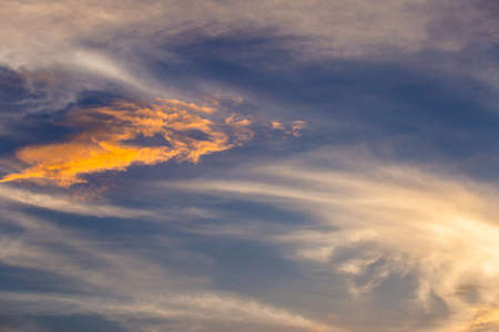 colorful dramatic sky with cloud at sunset.