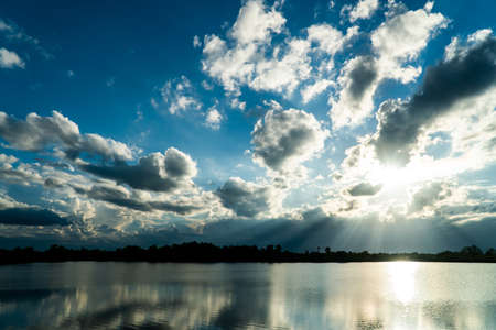 colorful dramatic sky with cloud at sunset.