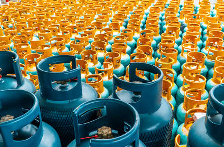 LPG gas bottle stack ready for sellの写真素材