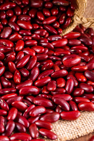 Red kidney beans in woodenの写真素材