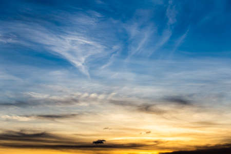 colorful dramatic sky with cloud at sunset.の写真素材