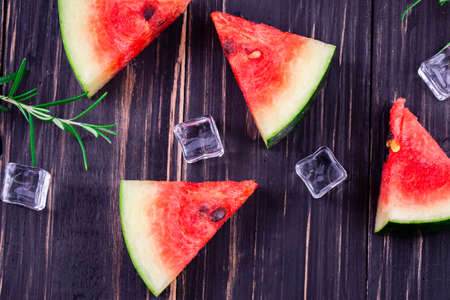 watermelon on wooden backgroundの写真素材