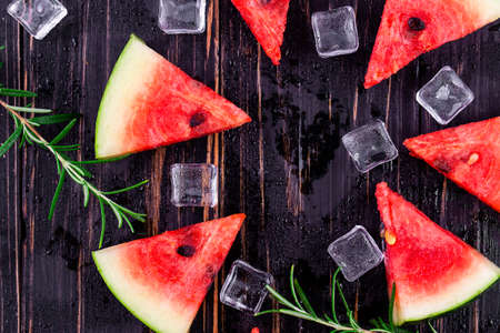 watermelon on wooden backgroundの写真素材