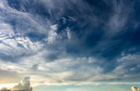 colorful dramatic sky with cloud at sunset.