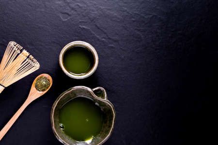 Organic Green Matcha Tea in a Bowlの写真素材