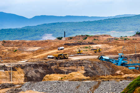 Part of a pit with big mining truck workingのeditorial素材