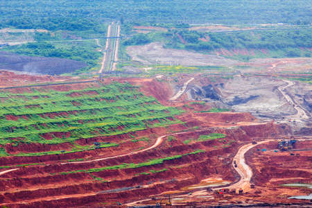 Part of a pit with big mining truck workingのeditorial素材