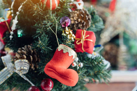 Christmas background with decorations and gift boxes on wooden