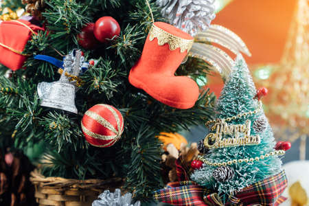 Christmas background with decorations and gift boxes on woodenの写真素材