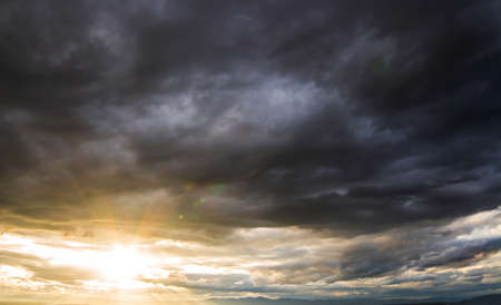 colorful dramatic sky with cloud at sunsetの写真素材