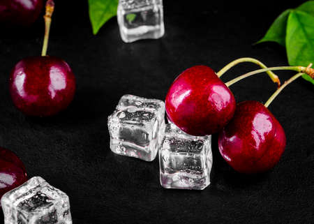 Ripe fresh cherry berry on wood tableの写真素材