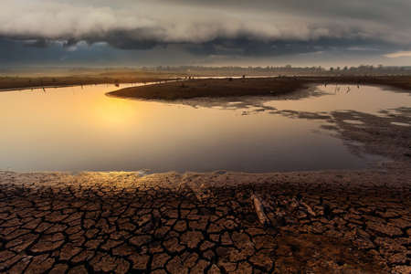 thunder storm sky Rain clouds Cracked dry land without wate