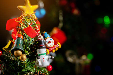 Christmas background with decorations and gift boxes on woodenの写真素材