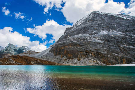 Colorful in autumn forest and snow mountain at Yading nature reserve, The last Shangri la