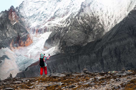 Colorful in autumn forest and snow mountain at Yading nature reserve, The last Shangri laの写真素材