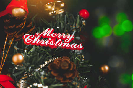 Christmas background with decorations and gift boxes on woodenの写真素材