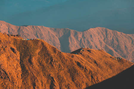 Top View Mulayit Taung golden light of the morning sun and the mist covered on Mount Mulayit,Myanmarの写真素材