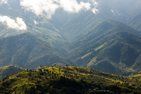 Top view Landscape of Morning Mist with Mountain Layer at north of Thailand. mountain ridge and...