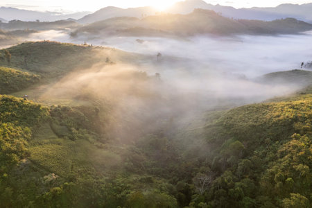 Top view Landscape of Morning Mist with Mountain Layer at north of Thailand. mountain ridge and...
