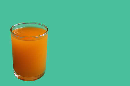 Full glass of orange juice. It is fresh.の写真素材