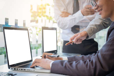 Business team colleagues discussing working with many document graph in team Meeting Talking Brainstorming Communication Concept.の写真素材