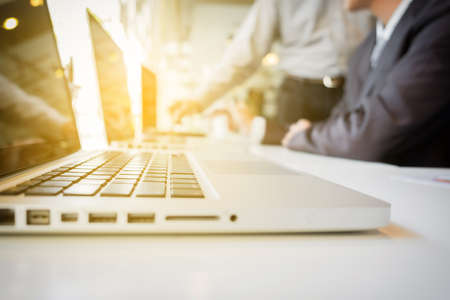 business Teamwork looking at report and having a discussion in office.の写真素材