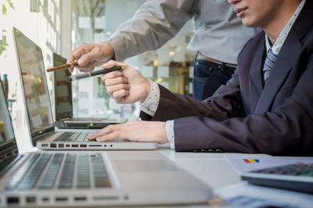 Business team working with computer, document graph in team Meeting Talking Discussion Brainstorming Communication Concept.の写真素材