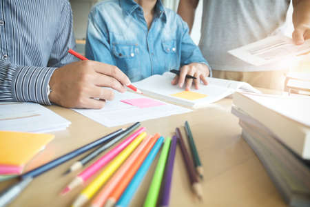 Education, teaching, learning and people concept. Group of high school students or classmates with...