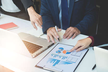Business team meeting working with new startup project.discussion and analysis data the charts and...