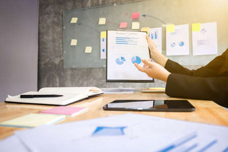 business women conference presentation with chart report of new plan marketing to development...