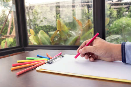 Creative creativity graphic designer working with graphics tablet,laptop and smart phone, colour...