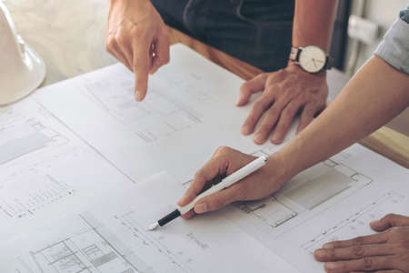 Image of engineer or architectural project, Close up of hands architects engineering working on...