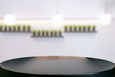 Image of Selected focus empty wooden table and Coffee shop or blurred cafe background of abstract...