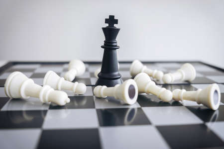 Chess leadership and success concept, chess save the strategy and king on chess board.の写真素材