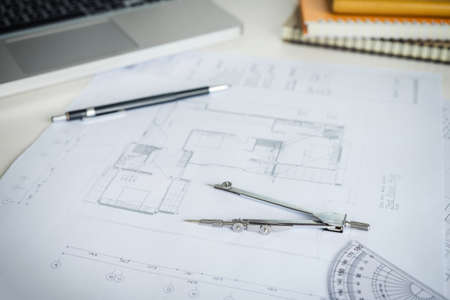 blueprint paper drafting project sketch architectural, dividers, ruler, engineering tools on workplace.の写真素材