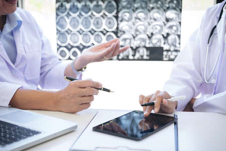 Professor Doctor discussion a method with patient treatment, results on brain x-ray film About the...