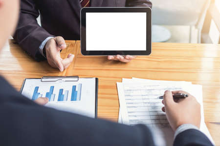 Business team meeting present, investor executive colleagues discussing new plan financial graph...