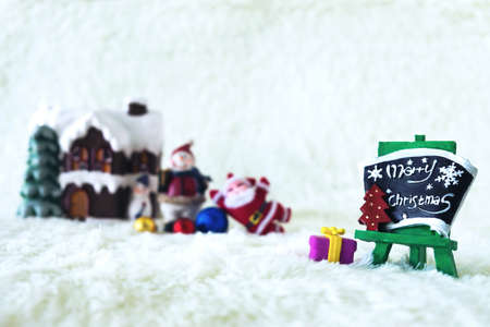 Christmas decoration Holiday with Santa Claus and snowman on snow background and copy space.の写真素材