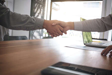 Meeting and greeting concept, Two confident Business handshake and business people after discussing...