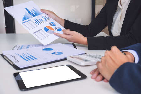 Business team two executive colleagues discussing and analysis working Financial investment on...