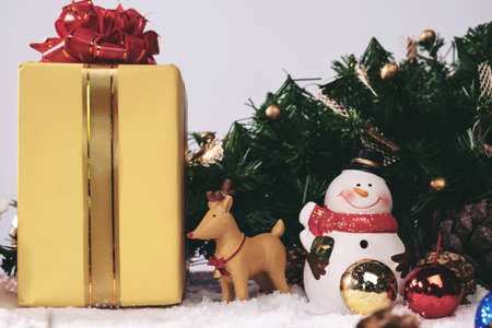 Christmas decoration Holiday or new year with Santa Claus and snowman on snow background and copy space.の写真素材