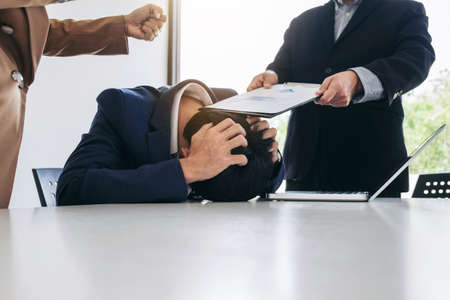 Business people conflict problem working in team turns into fight.の写真素材